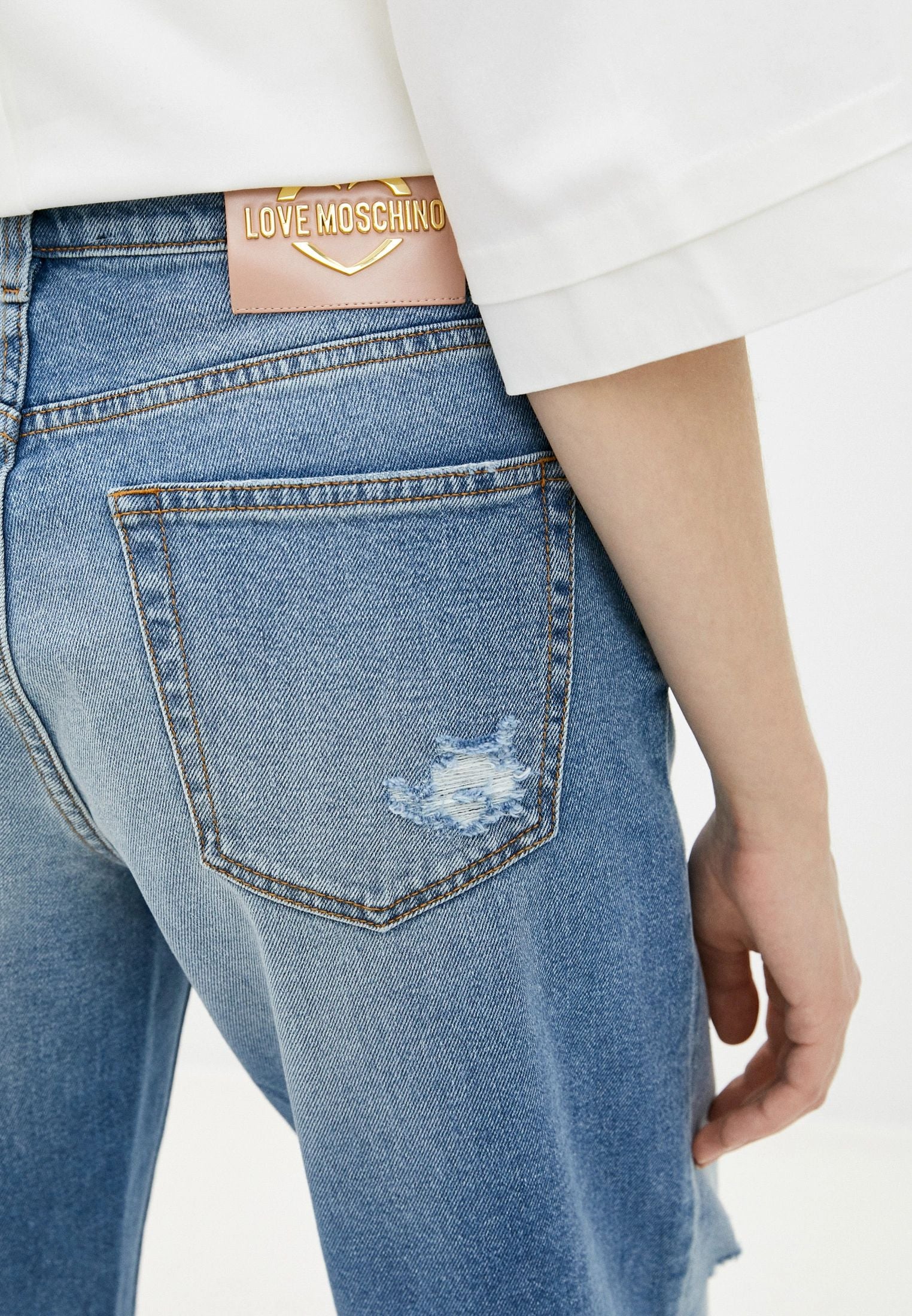 Chic Distressed Love Moschino Jeans - GlamHub Luxury and Icon Brand Clothing