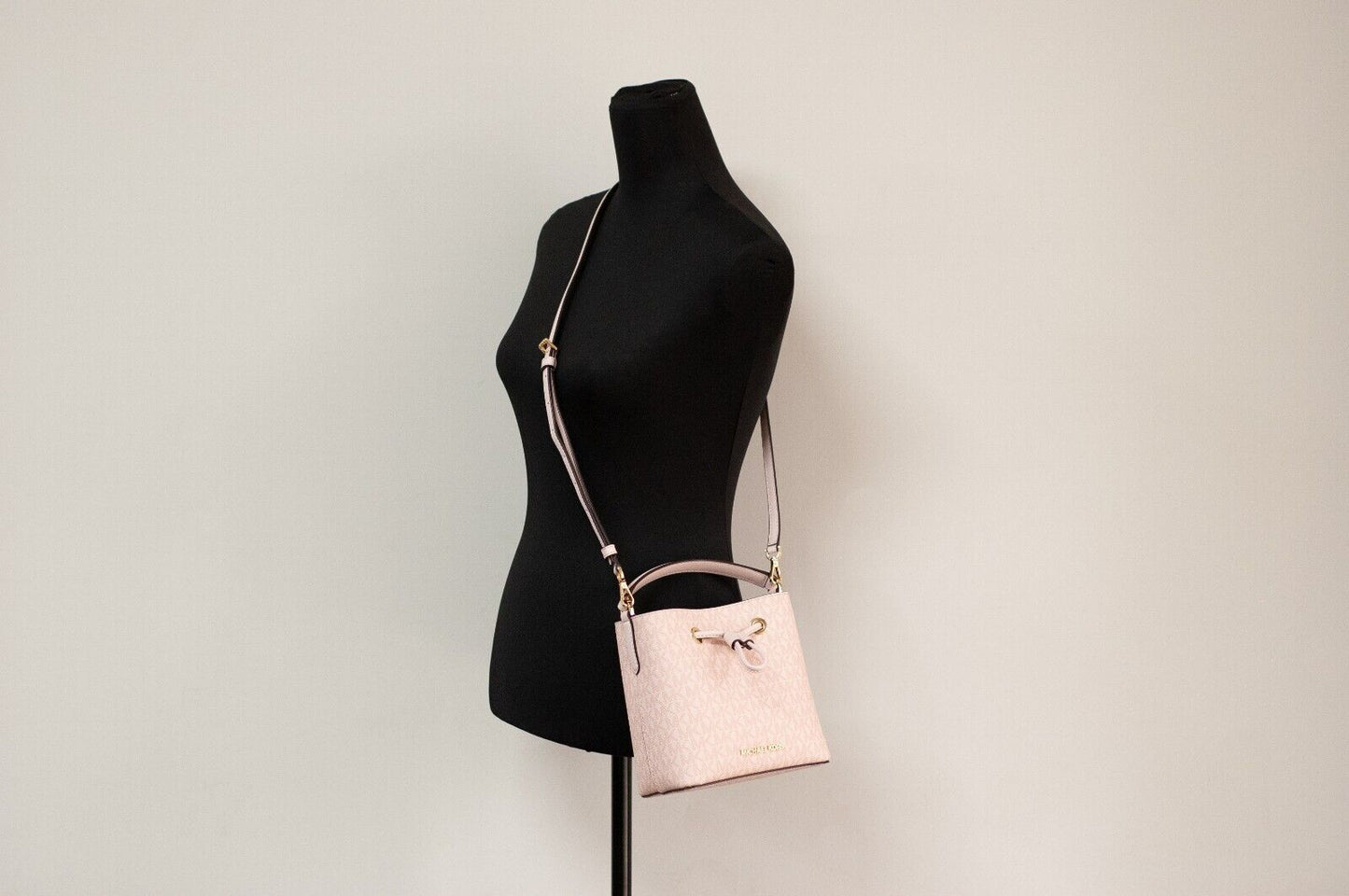 Suri Small Dark Powder Blush Signature PVC Bucket Crossbody Handbag - GLAMHUB BOUTIQUE 