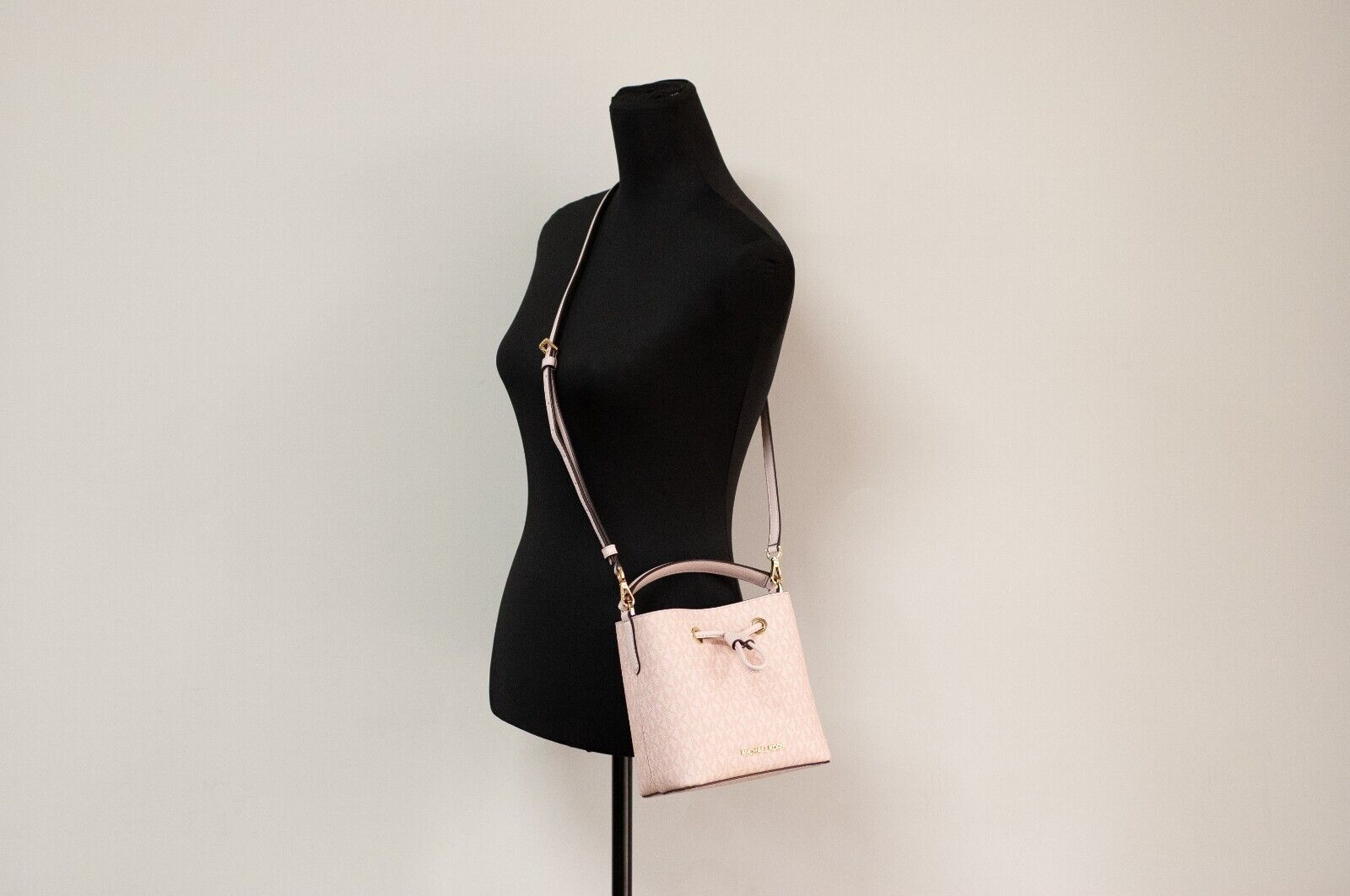 Suri Small Dark Powder Blush Signature PVC Bucket Crossbody Handbag - GLAMHUB BOUTIQUE 